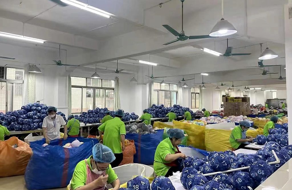 Plush toy production workshop and bulk manufacturing process at Kinwow